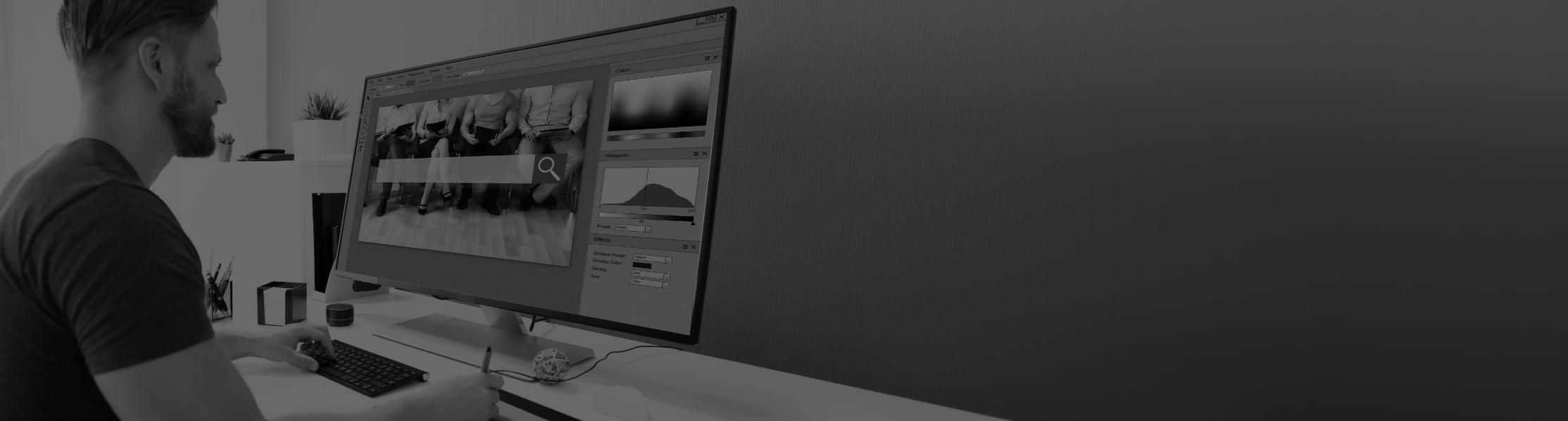Image of a web designer working at a computer