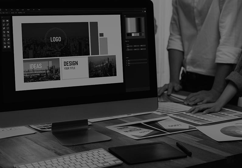 Graphic showing people standing around a desk with a screen and papers with designs