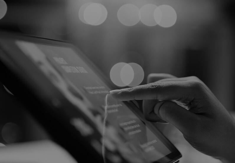 Image showing a close up of someone using a tablet